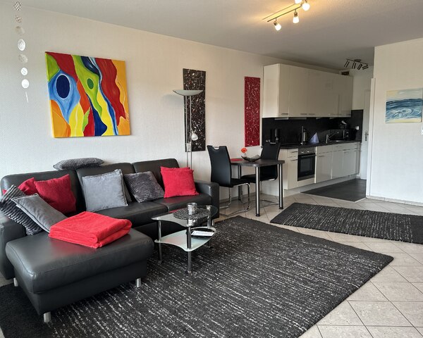 Ferienwohnung Büsum : Wohnzimmer mit offener Küche